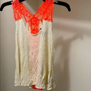 White top with a coral color straps
